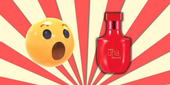 frasco perfume natura una somos, emoji emoticon de espanto, fundo listrado em vermelho e branco